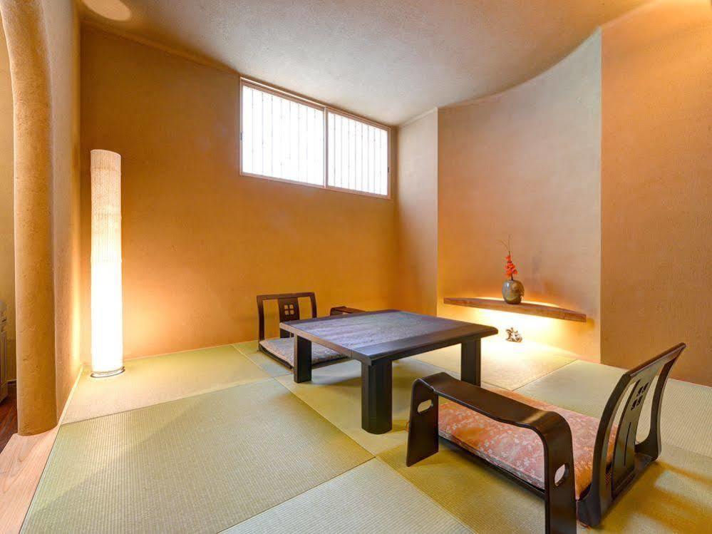 Yunokawa Onsen Shouen Hotel Sinzi Bagian luar foto